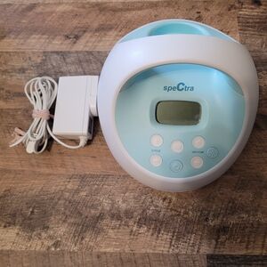 Blue and White Breast Pump